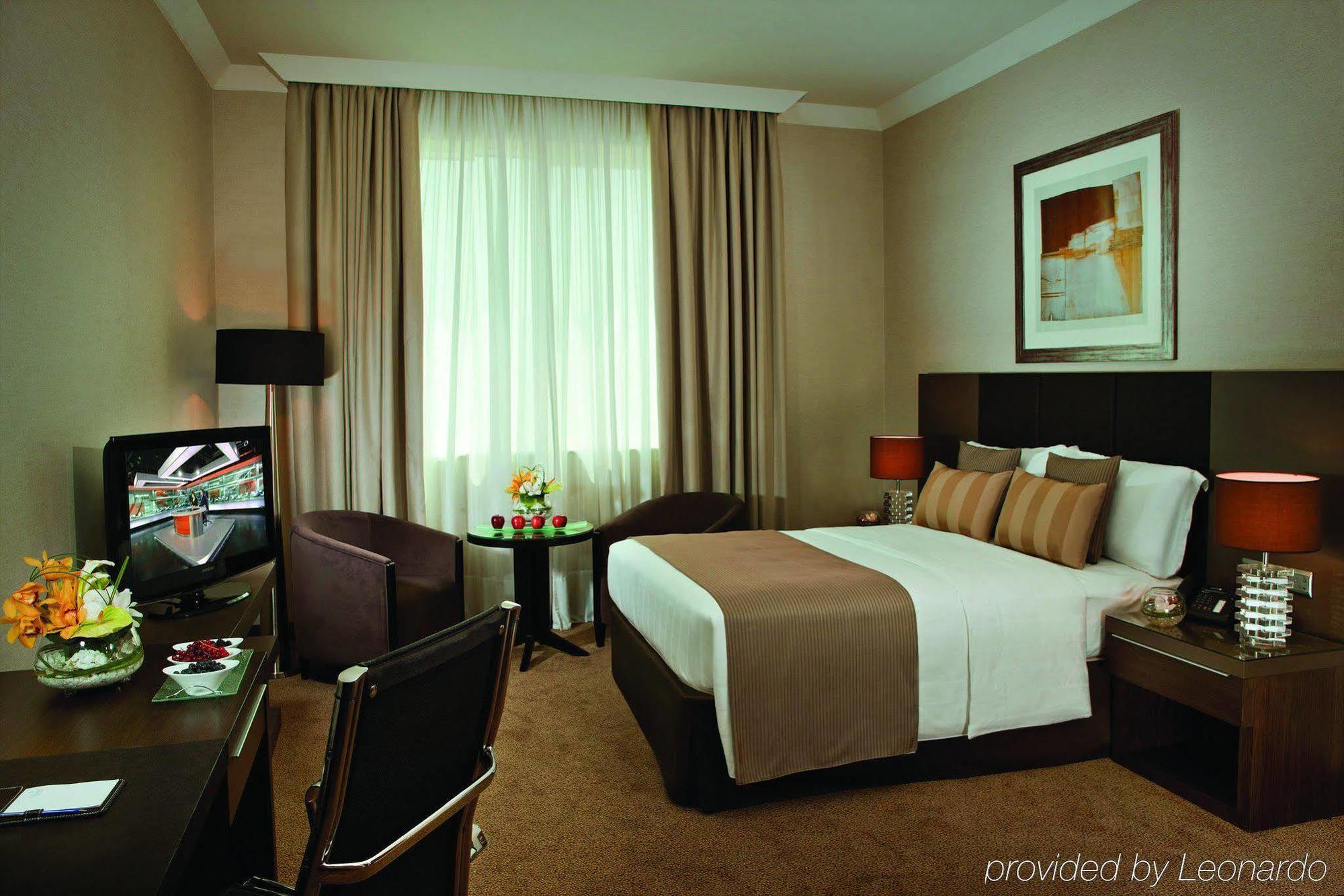 Hotel Ramada Downtown Abou Dabi Chambre photo
